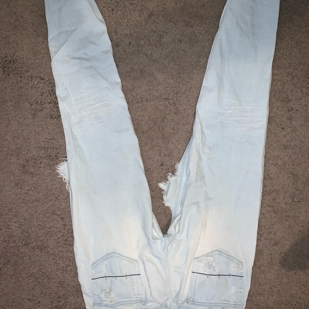 Machine womens genes they are ripped size 7 very comfortable to wear.